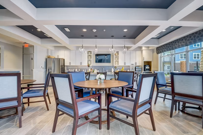 Clubhouse featuring modern dÃ©cor and plush seating at Outlook Hamilton Apartments for communal gatherings and relaxation