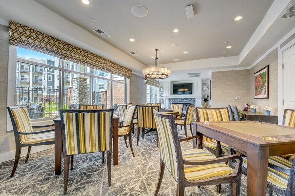 Clubhouse featuring comfortable seating and modern decor at Outlook Hamilton Apartments