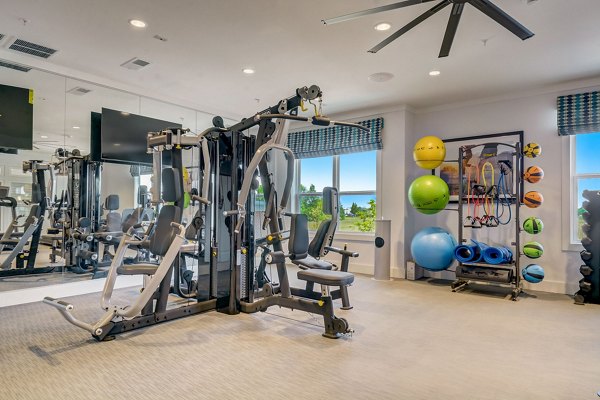 State-of-the-art fitness center with modern equipment at Outlook Hamilton Apartments