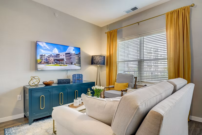 Spacious living room with modern decor at Outlook Hamilton Apartments