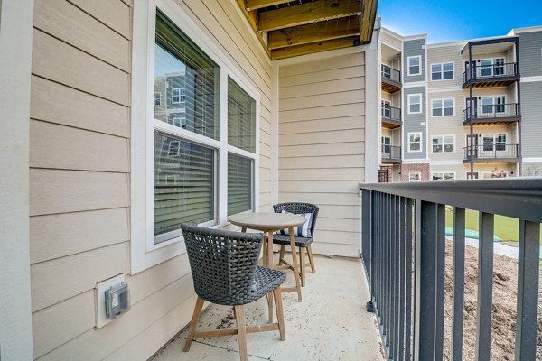 Patio with comfortable seating at Outlook Hamilton Apartments