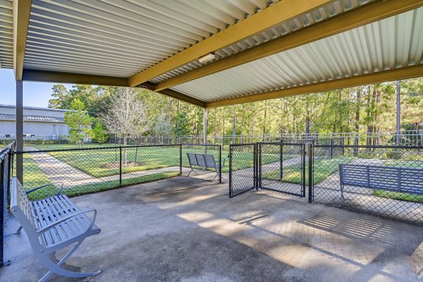 Alders Magnolia Apartments: Well-maintained dog park and play area for residents' pets
