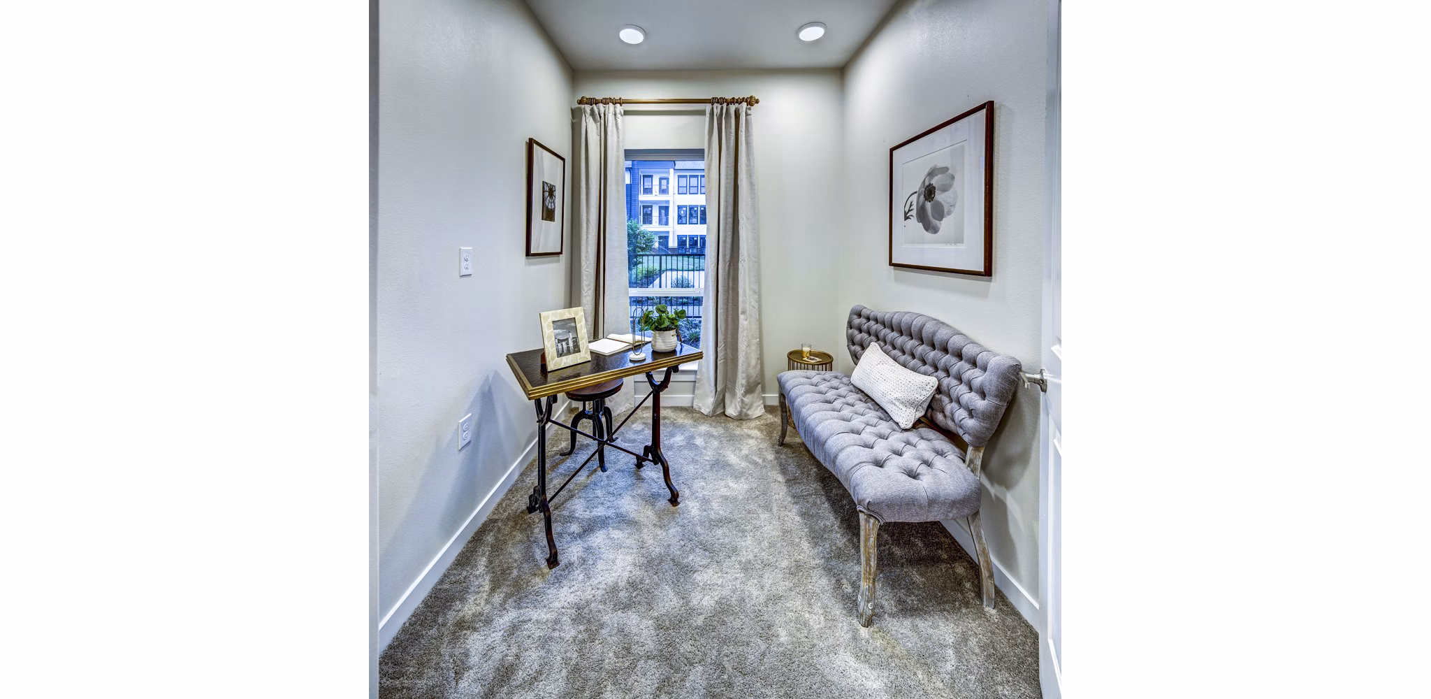 Home office with ergonomic chair and large desk at NorthStar Georgetown Apartments