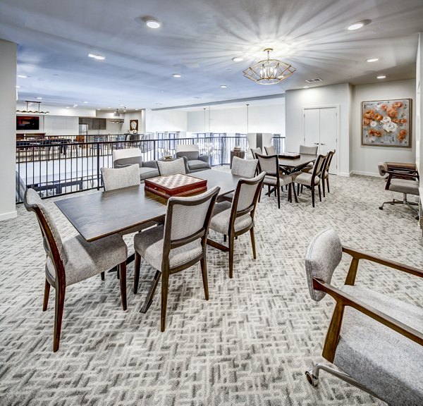 Clubhouse space with modern seating and decor at NorthStar Georgetown Apartments