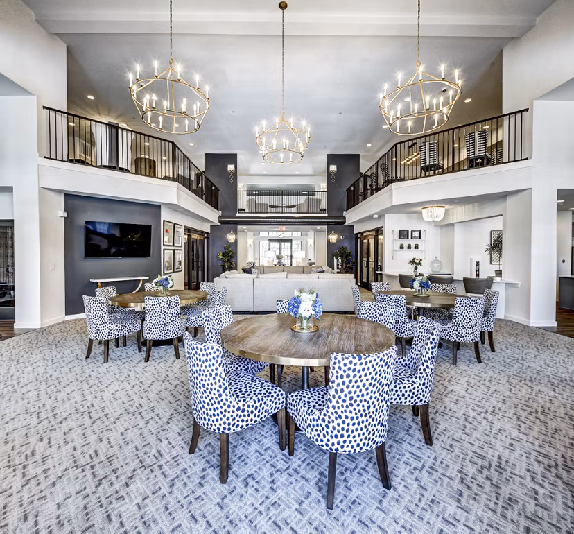 Clubhouse featuring modern lounge with seating areas at NorthStar Georgetown Apartments