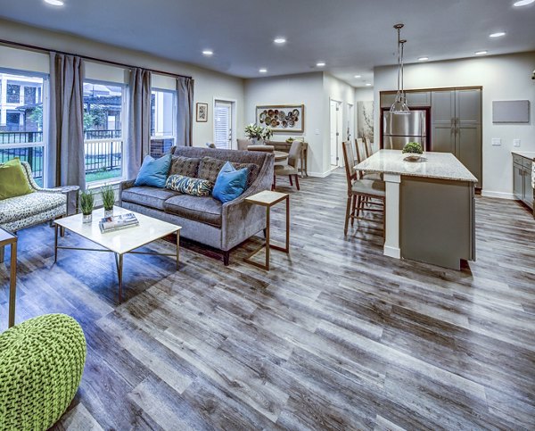 Spacious living room with modern decor in NorthStar Georgetown Apartments