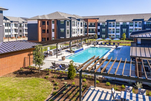 Resort-style pool with lounge chairs at NorthStar Georgetown Apartments