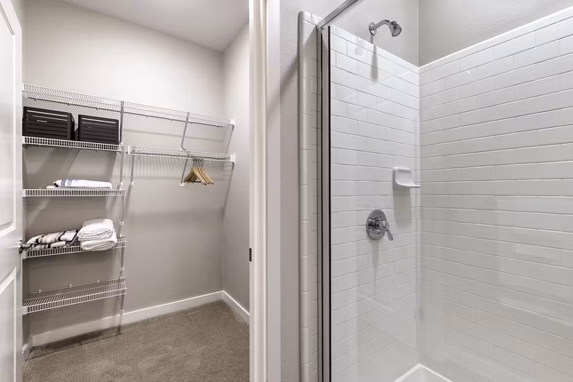 Cozy bedroom with elegant decor in The Orchards at Arlington Highlands Apartments