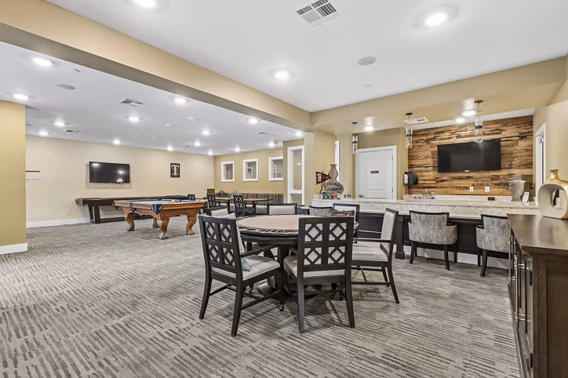 Modern meeting facility with sleek conference table at The Orchards at Arlington Highlands Apartments