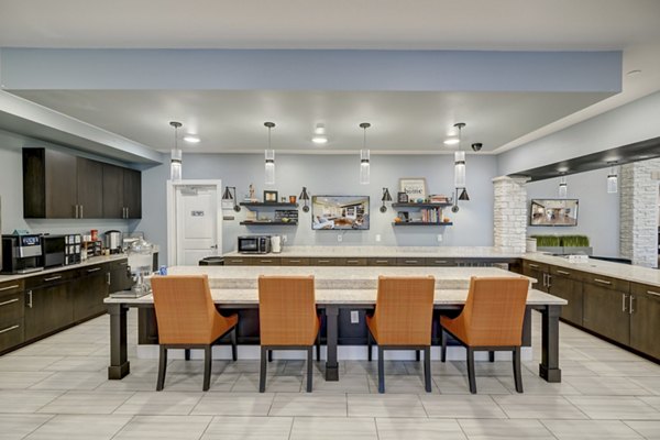 Clubhouse featuring modern design and stylish seating at The Orchards at Arlington Highlands Apartments