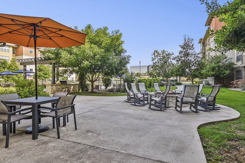 Cozy outdoor fire pit area at The Orchards at Arlington Highlands Apartments