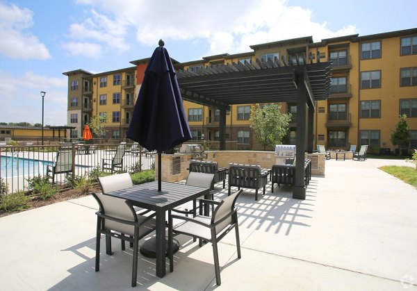 grill area at The Orchards at Arlington Highlands Apartments