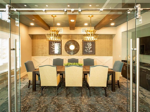 Modern meeting facility with ergonomic seating at The Orchards at Market Plaza Apartments