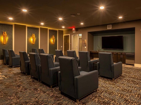 Theater with plush seating at The Orchards at Market Plaza Apartments