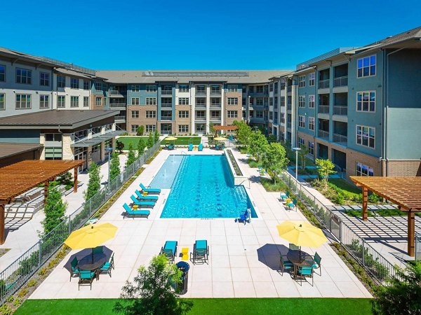 Spacious pool area at The Orchards at Market Plaza Apartments offering luxury living and relaxation