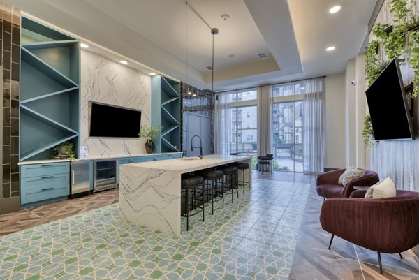 Elegant entertainment space with pool table in clubhouse at Encore Grayson Apartments