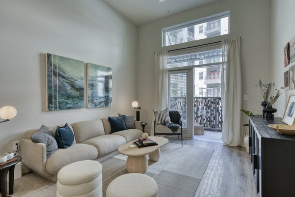 Spacious living room with modern decor at Encore Grayson Apartments