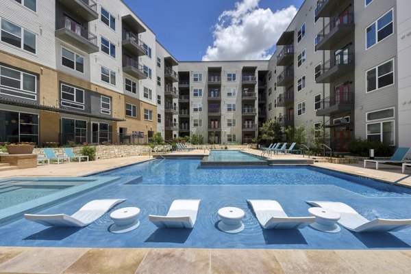 Inviting pool at Encore Grayson Apartments, perfect for relaxation in a luxury setting