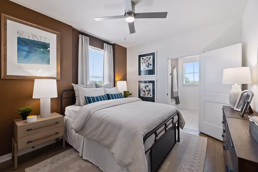 Modern bedroom with elegant decor at Silos Harvest Green Apartments