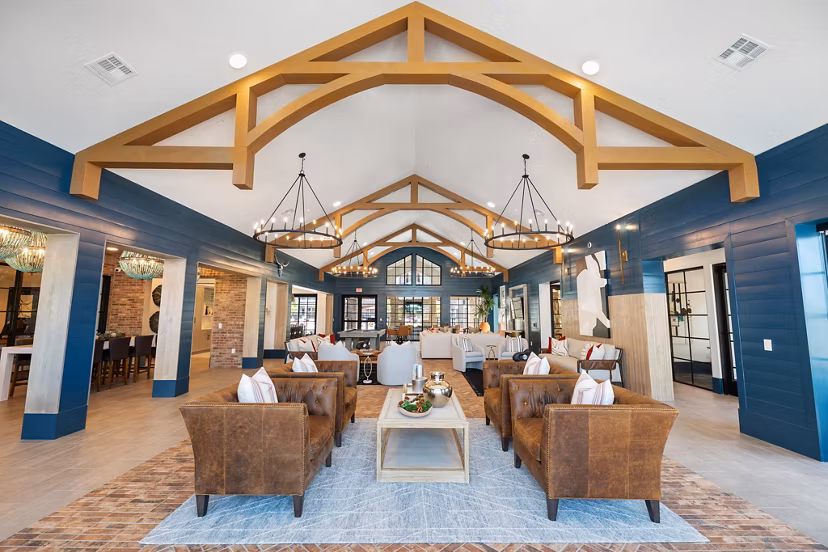 Clubhouse with modern seating and communal spaces at Silos Harvest Green Apartments in Richmond, featuring stylish interiors for social gatherings