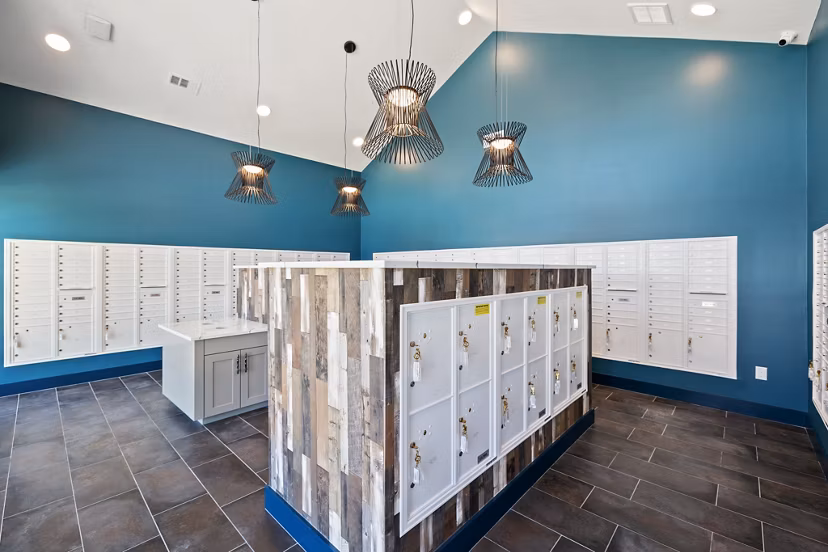 Mail room with secure package lockers at Silos Harvest Green Apartments