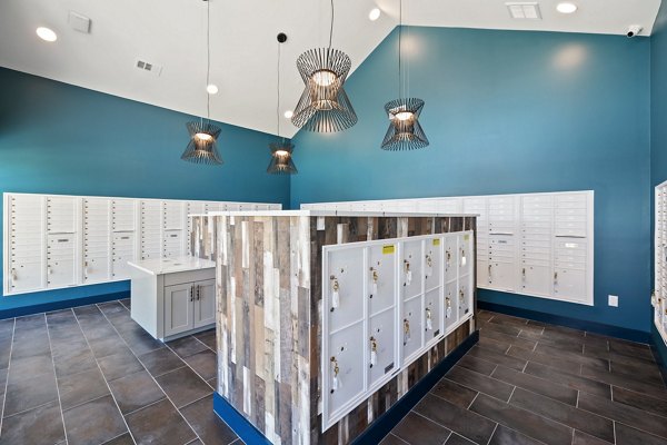 Mail room with secure package lockers at Silos Harvest Green Apartments