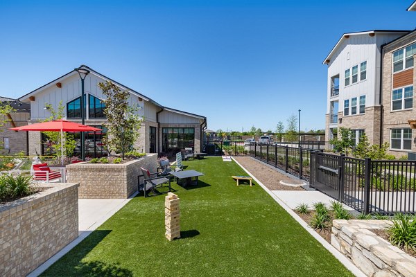 Silos Harvest Green: Serene courtyard area featuring lush landscaping in a luxury apartment community