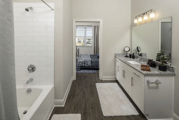 Modern bathroom with sleek fixtures at Prose McCullough Station Apartments