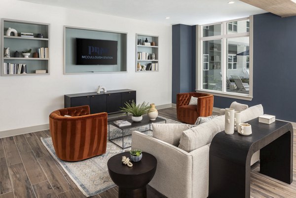 Modern clubhouse with cozy seating at Prose McCullough Station Apartments