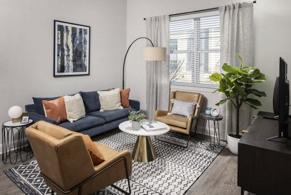 Modern living room with stylish decor at Prose McCullough Station Apartments, ideal for luxury living