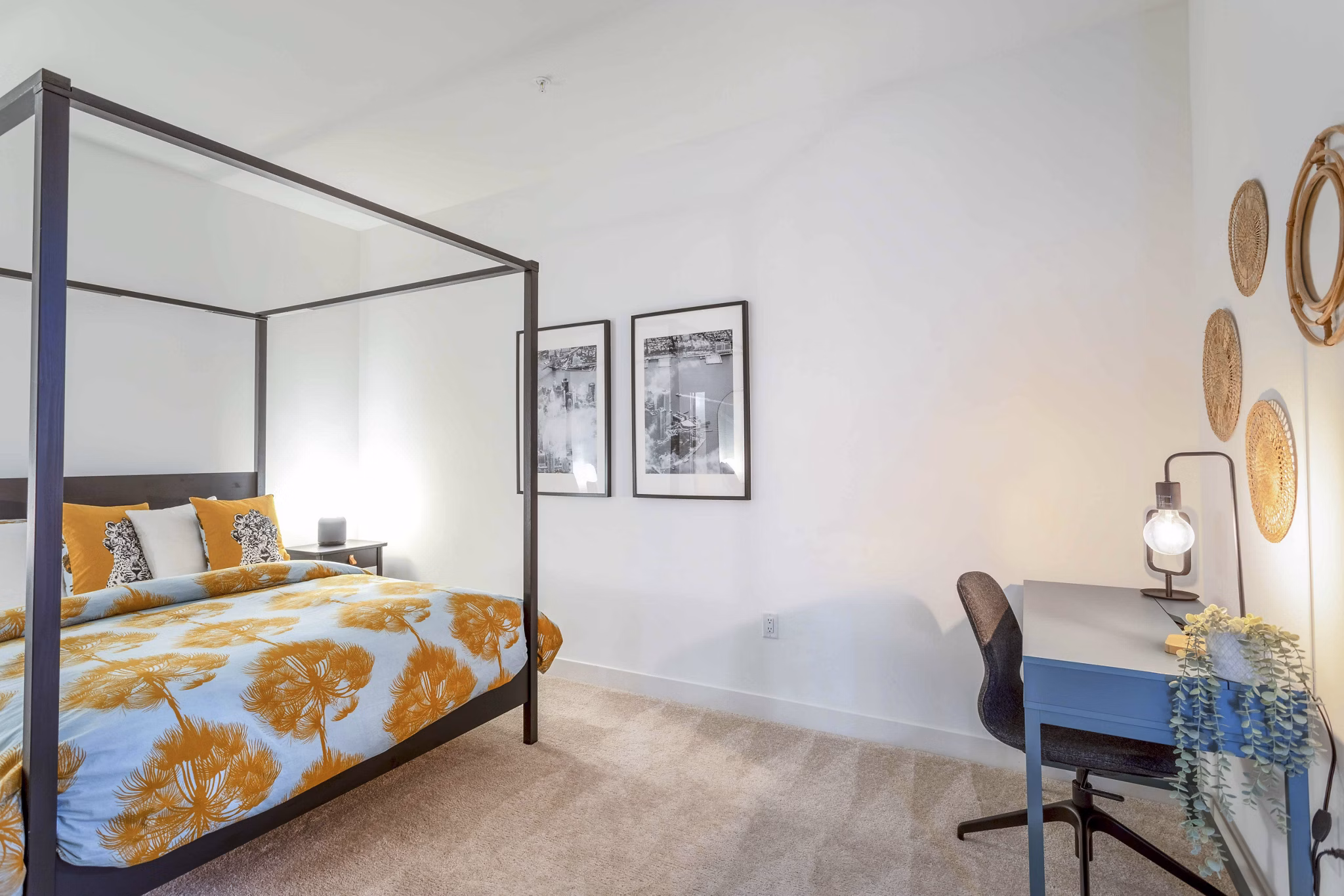 Comfortable bedroom with natural light at The Lydell Apartments