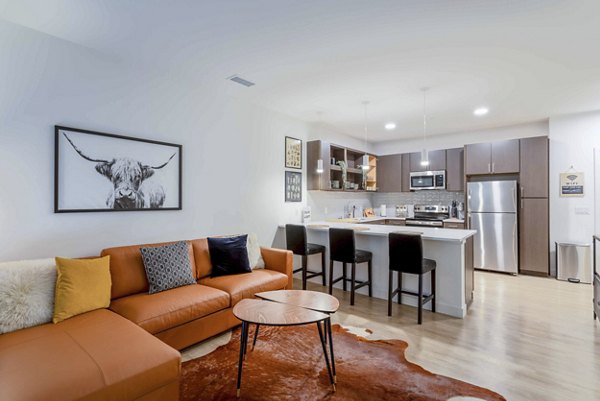 Modern living room with sleek furnishings at The Lydell Apartments, a luxury residence by Greystar in a prime location
