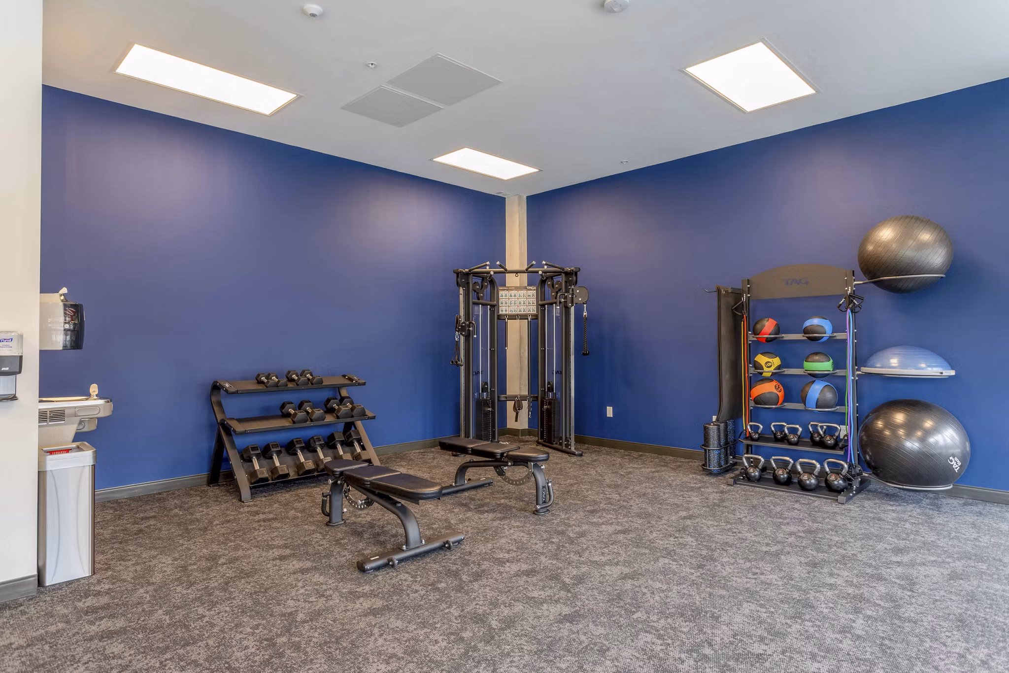 Fitness center with modern equipment at The Lydell Apartments