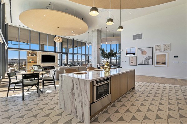 Clubhouse with modern design at One Seven Belleview Station Apartments featuring luxury amenities and stylish furnishings