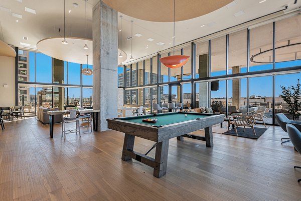 Luxury clubhouse with stylish contemporary design at One Seven Belleview Station Apartments, perfect for social gatherings and relaxation