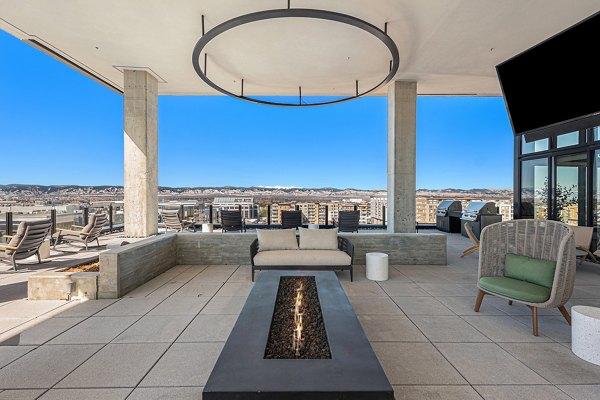 Cozy outdoor fire pit area at One Seven at Belleview Station Apartments, perfect for social gatherings and relaxation