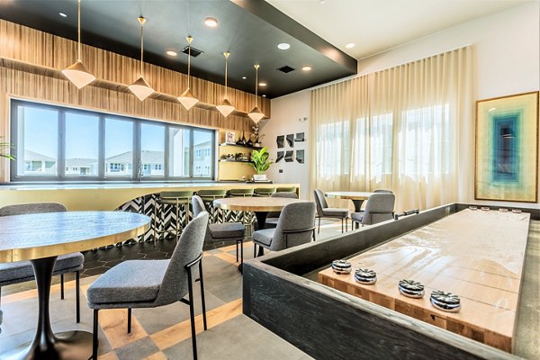 Elegant clubhouse featuring a modern design and cozy seating at Birchway Rivergate Apartments