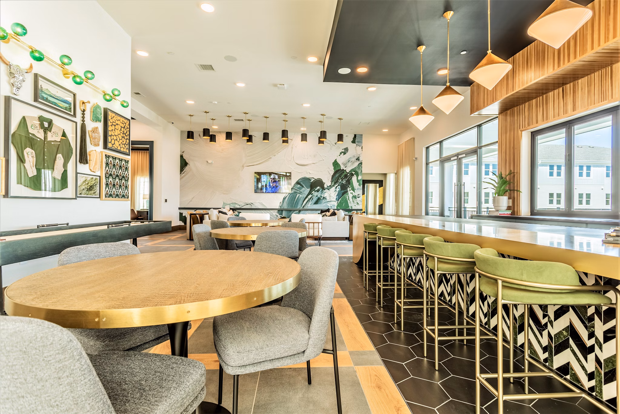 Modern clubhouse with entertainment options at Birchway Rivergate Apartments, surrounded by serene landscapes for luxury living