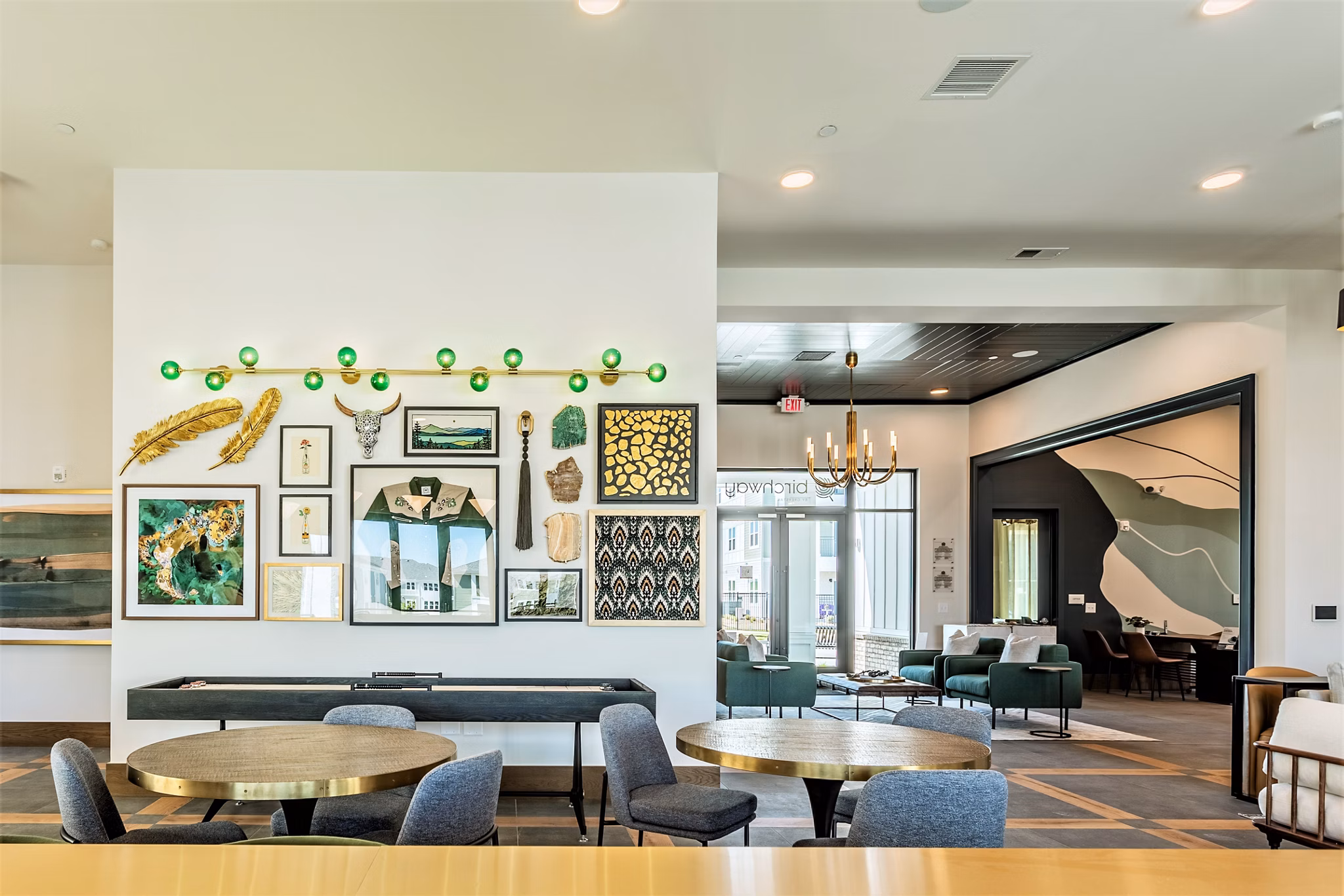 Clubhouse featuring modern design and cozy seating at Birchway Rivergate Apartments, offering luxury living spaces for residents