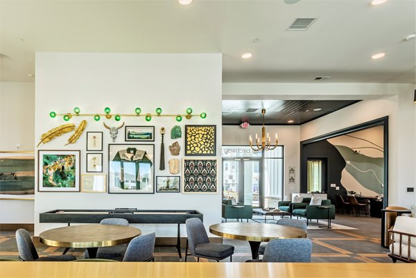 Clubhouse featuring modern design and cozy seating at Birchway Rivergate Apartments, offering luxury living spaces for residents