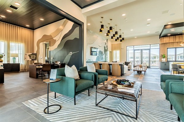 Clubhouse at Birchway Rivergate Apartments featuring modern design and ample seating spaces in a luxury setting