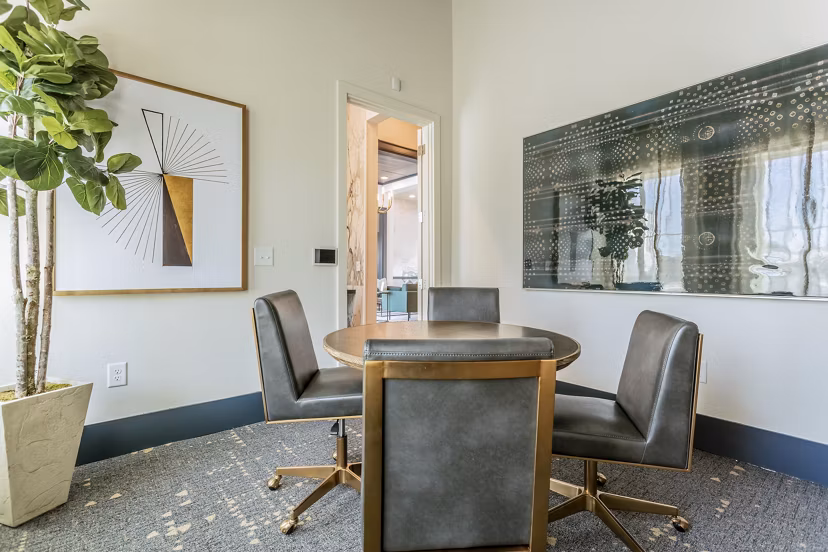 Modern meeting facility with state-of-the-art technology at Birchway Rivergate Apartments, providing a professional setting for business gatherings