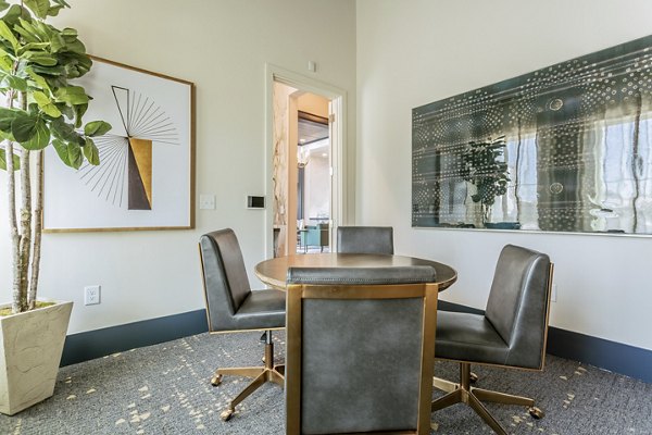 Modern meeting facility with state-of-the-art technology at Birchway Rivergate Apartments, providing a professional setting for business gatherings