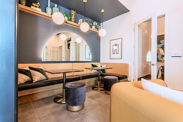 Clubhouse with modern lounge space at Birchway Rivergate Apartments