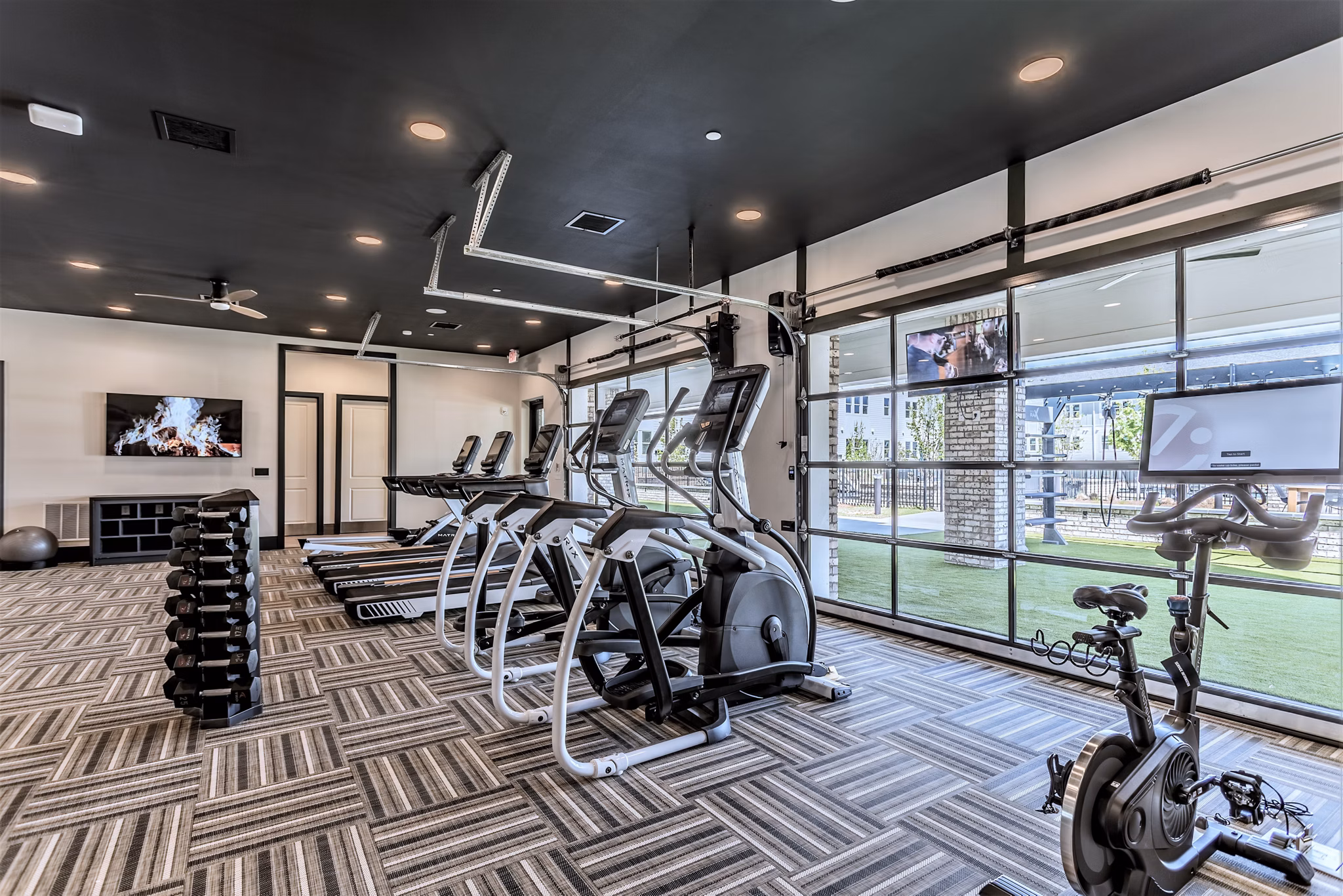 Modern fitness center with state-of-the-art equipment at Birchway Rivergate Apartments Enjoy luxury amenities for a healthy lifestyle