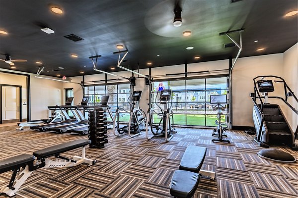 fitness center at Birchway Rivergate Apartments