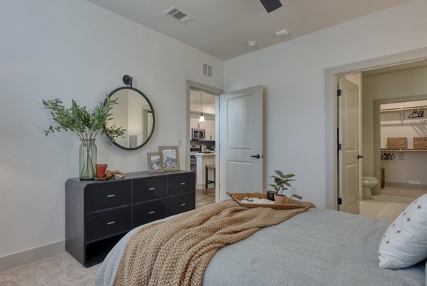 bedroom at The Cortesin at Eilan Apartments