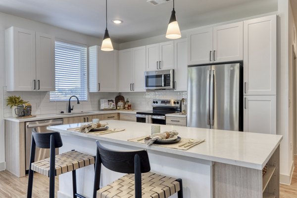 kitchen at The Cortesin at Eilan Apartments