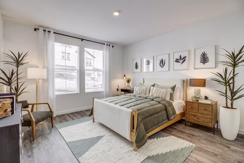 Vida at Morgan Hill Apartments: Cozy bedroom with modern design touches in luxury apartment