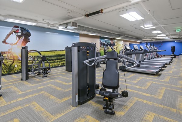 Modern fitness center with state-of-the-art equipment at Novi at Queen Anne Apartments